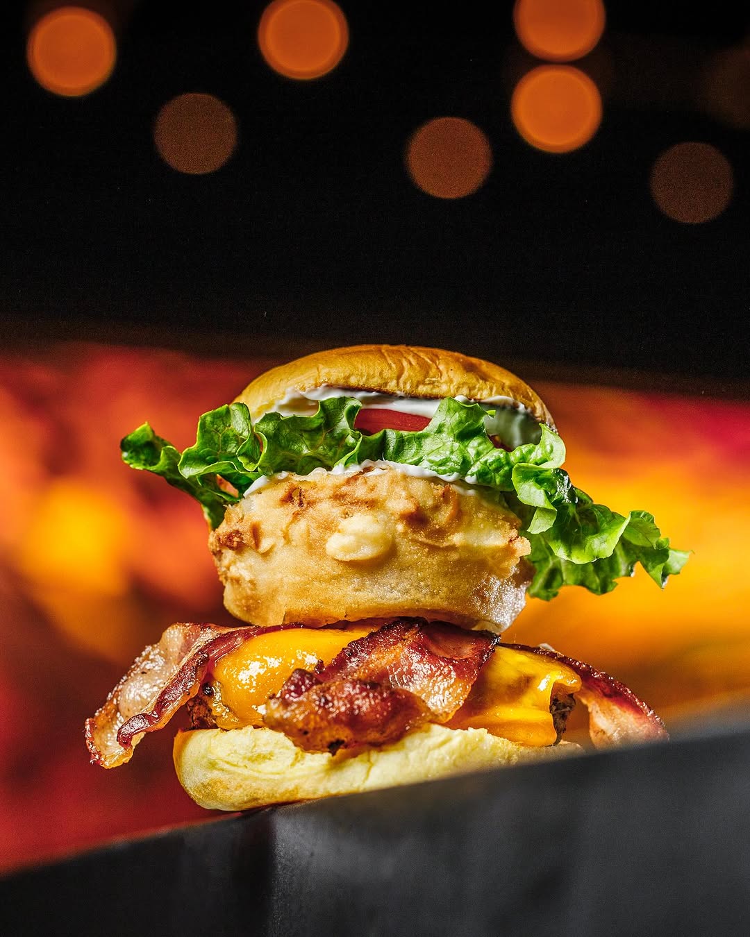 The Texan Burger: A Bold BBQ Delight with Aged Cheddar and Crispy Onion Rings